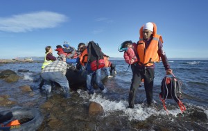 Refugees land on a beach near Molyvos, on the Greek island of Lesbos, after crossing the Aegean Sea from Turkey. Photo: Paul Jeffrey / World Council of Churches